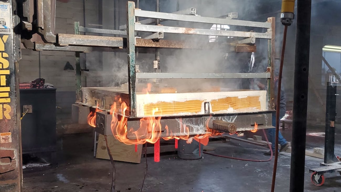 a stove top oven sitting inside of a building