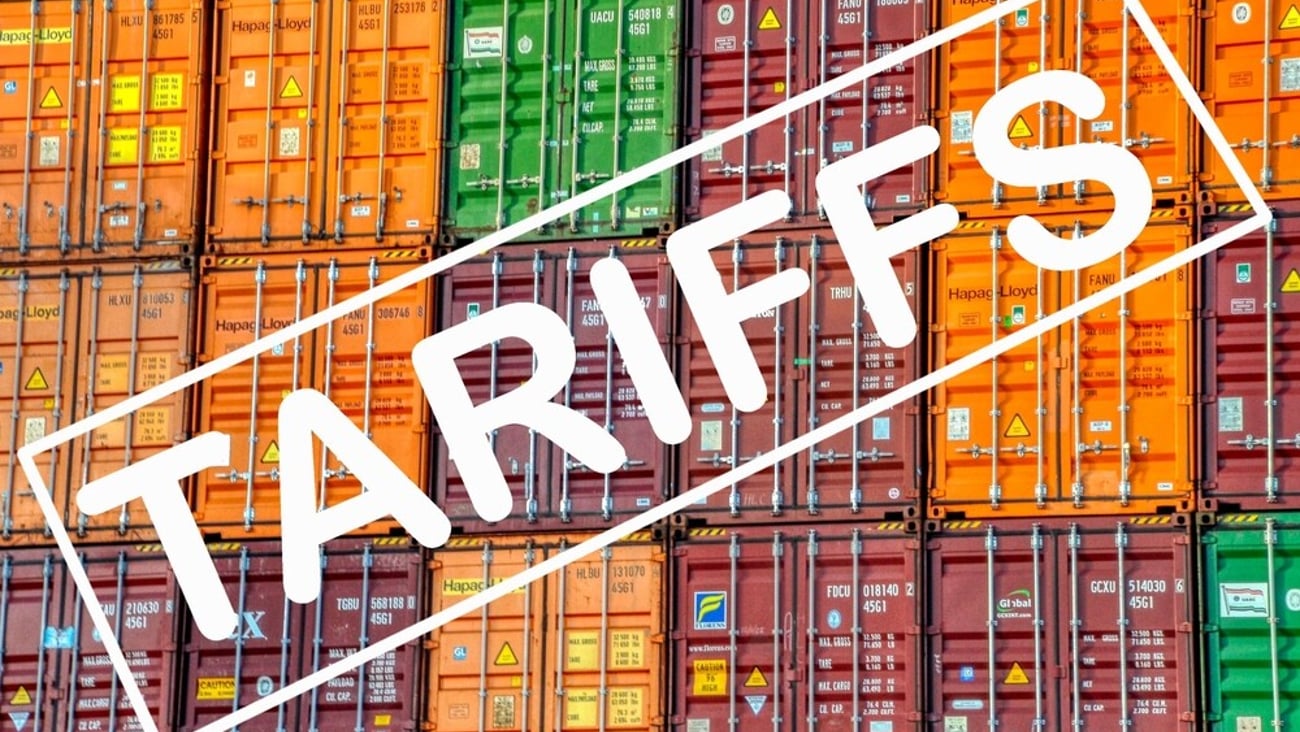 shipping containers and the word tariffs; Shutterstock ID 2595648185