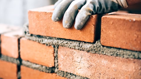 a close up of a brick building