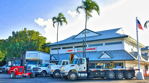 a truck is parked in front of a building