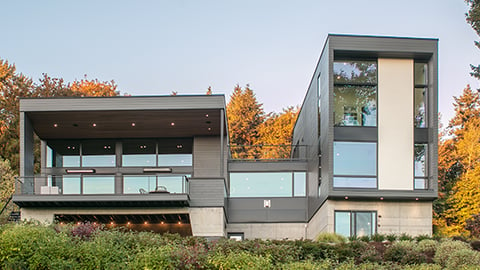 a house with trees in the background