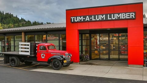 a truck is parked on the side of a building