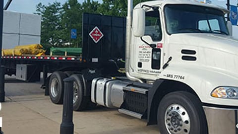 a truck is parked on the side of a road