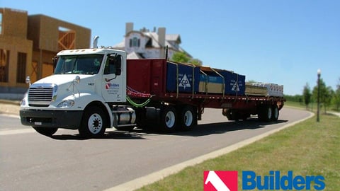 a truck that is driving down the road