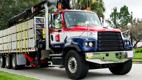 a truck that is driving down the road