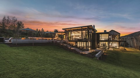 a train that is on top of a grass covered field