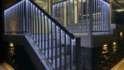 a building with a metal railing