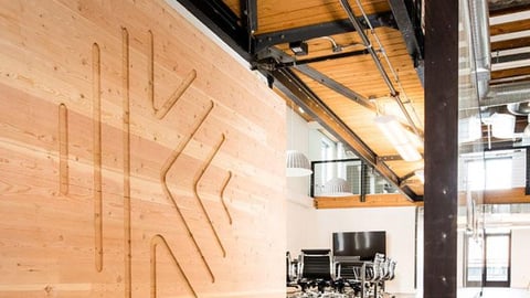 a kitchen with a wood floor