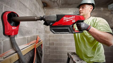 a man holding a baseball bat