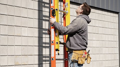 a person standing in front of a building