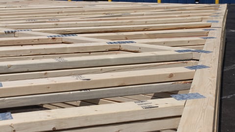 a row of wooden benches sitting on top of a bench