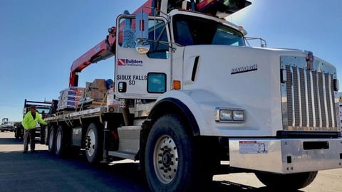 a truck that is driving down the road