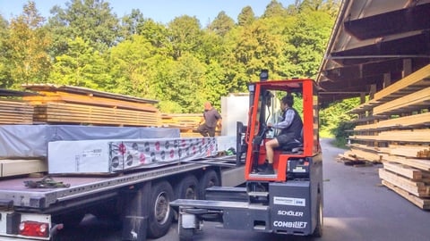 a truck that is driving down the road