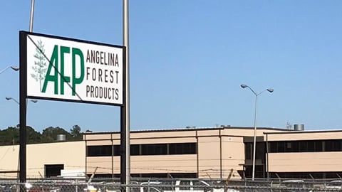 a street sign in front of a building