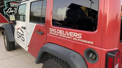 a bus parked on the side of a truck