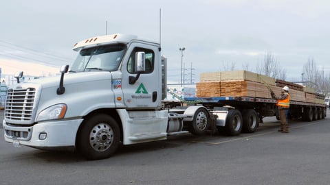 a truck is parked on the side of a road