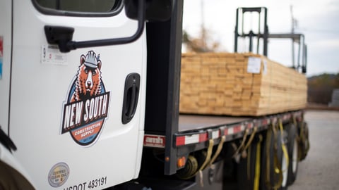 a truck is parked on the side of a road