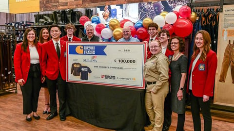 Representatives from Tractor Supply Company and Carhartt make a big donation to SkillsUSA.