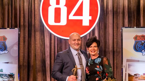 84 Lumber Manager of the Year, Matt Born, with company president Maggie Hardy Knox.