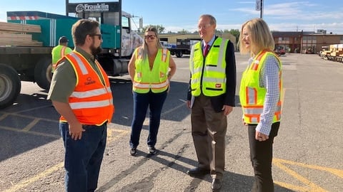 Franklin Building Supply CEO Levi Smith speaks with U.S. Senator Mike Crapo (R-ID)  and his wife Susan Crapo.