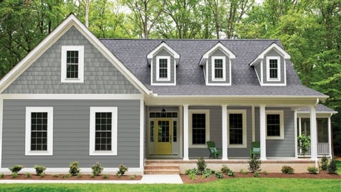 A home featuring Alside's ASCEND composite siding in Sterling Gray.