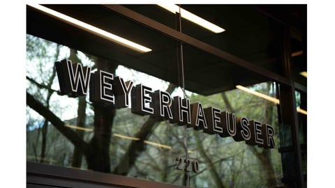 Weyerhaeuser name reflection in glass Shutterstock