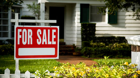 For sale sign outside a family house; Shutterstock ID 1576779889