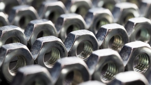 steel fasteners bolt nuts made of high-quality alloy steel and other elements for secure fastening of elements, nuts are used for fixing various elements, close-up nut; Shutterstock ID 1852518019