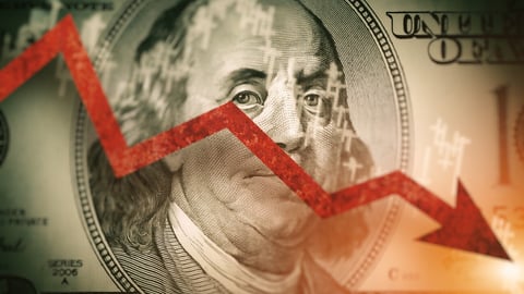 Closeup detail of  dollar bill.  Economist forecast for the United States. Glowing red arrow going downwards on Benjamin Franklin portrait on dollar bill.  Effect of recession on US economy.; Shutterstock ID 2090787709