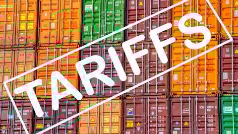 shipping containers and the word tariffs; Shutterstock ID 2595648185