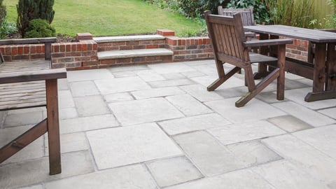 New flagstone patio and backyard, outdoor garden patio with furniture, UK; Shutterstock ID 1714019749