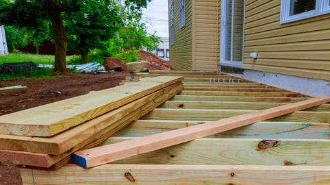 A new wooden, timber deck being constructed; Shutterstock ID 1099473815