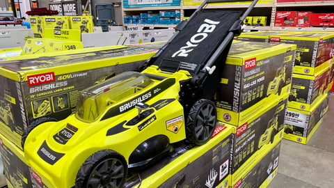 Ros, CA - March 12, 2021: Ryobi electric battery powered 20in brushless lawn mowers inside a home improvement store. ; Shutterstock ID 1934831627