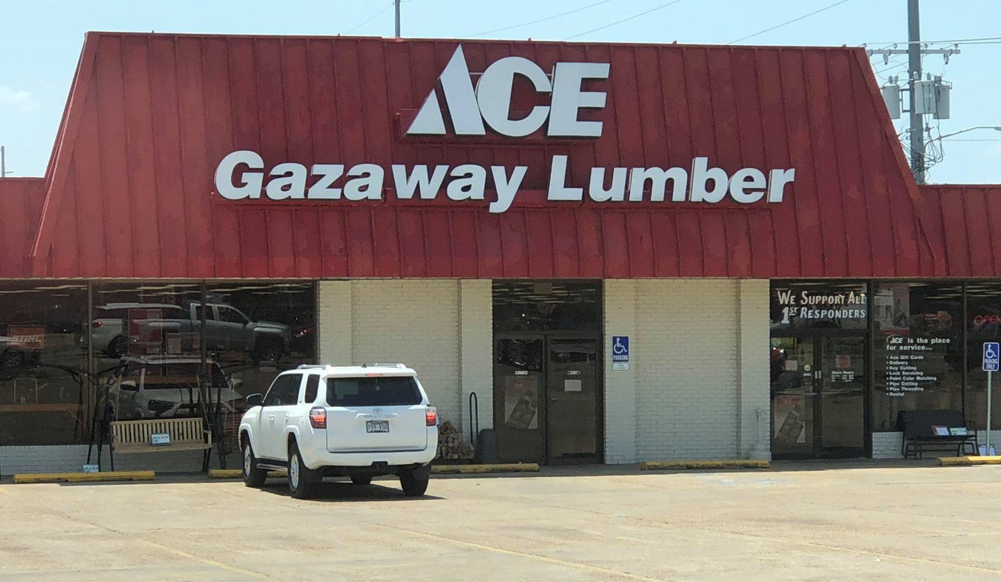 a sign on an awning on the side of a building