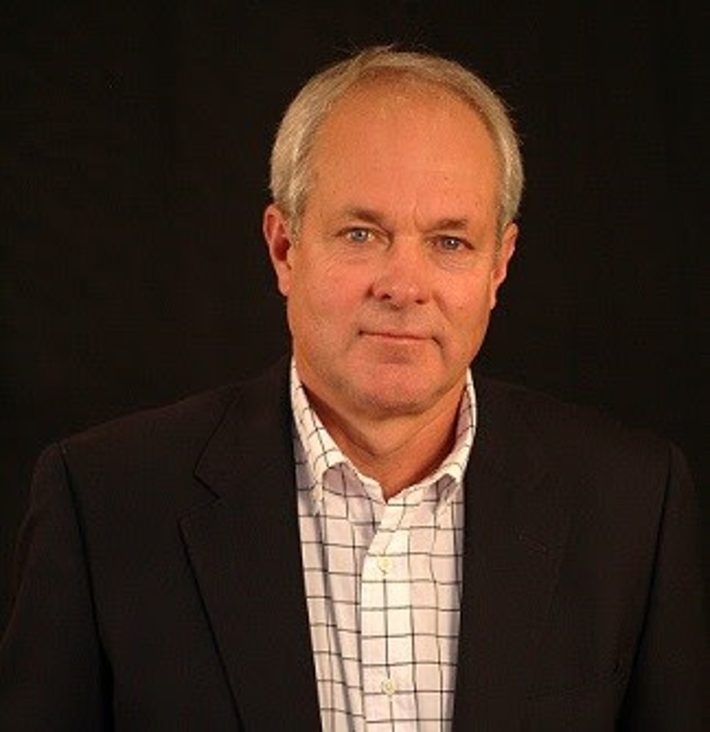 a man wearing a suit and tie