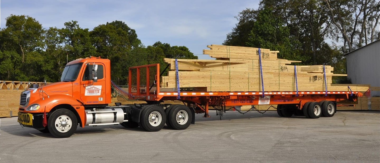 a truck is parked on the side of a road