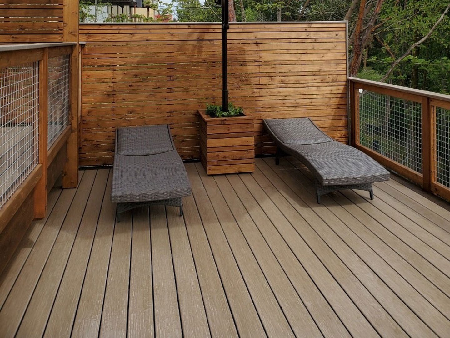 a wooden bench sitting in front of a building