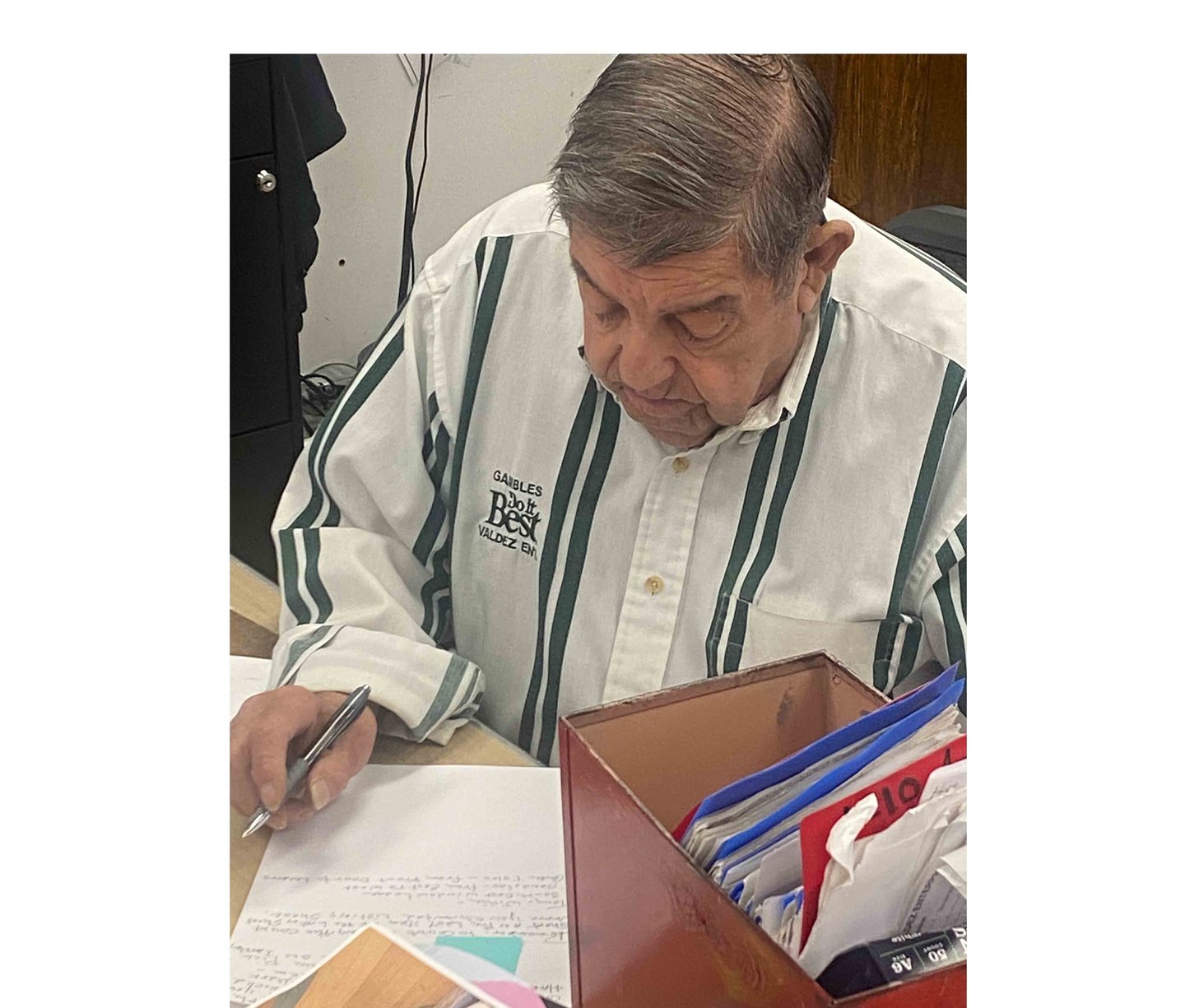 Anselmo at desk