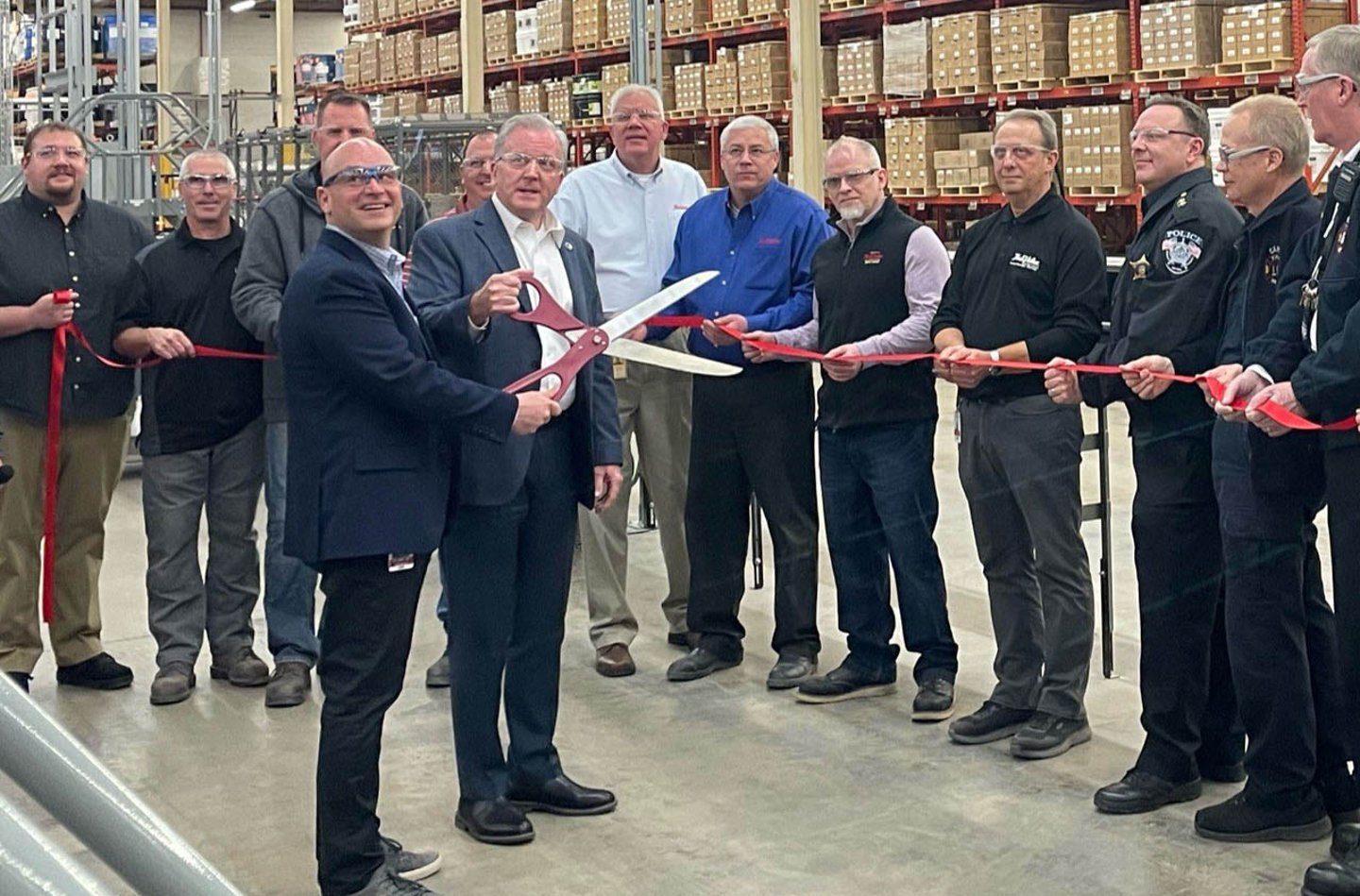 True Value Mfg ribbon-cutting