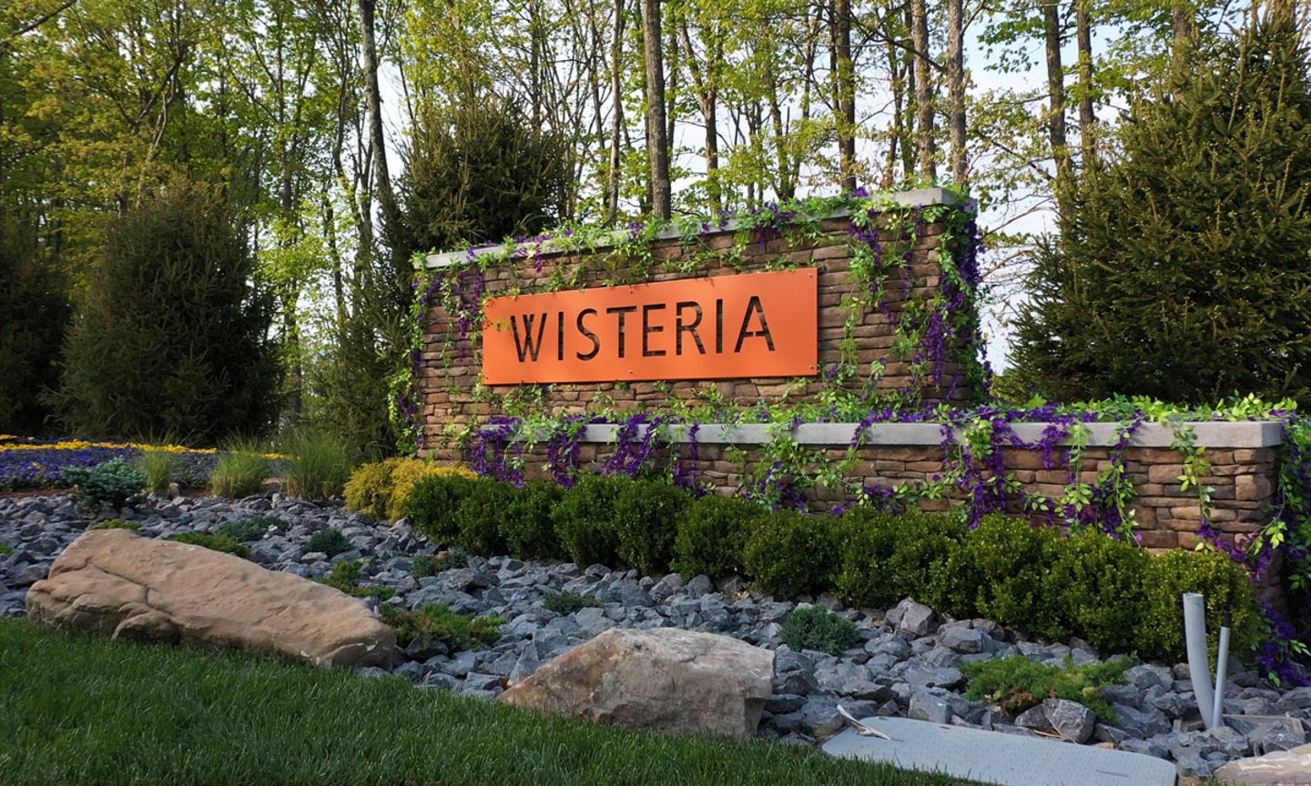 Wisteria Logo signage 84 Lumber