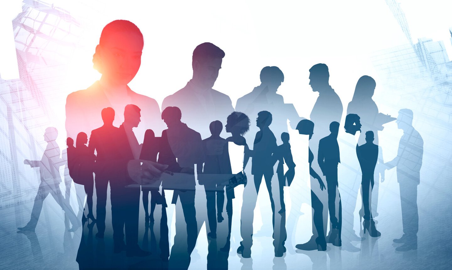 Business team members with young woman leader over skyscrapers background. Concept of diversity, teamwork and corporate lifestyle. Toned image double exposure; Shutterstock ID 1376909315
