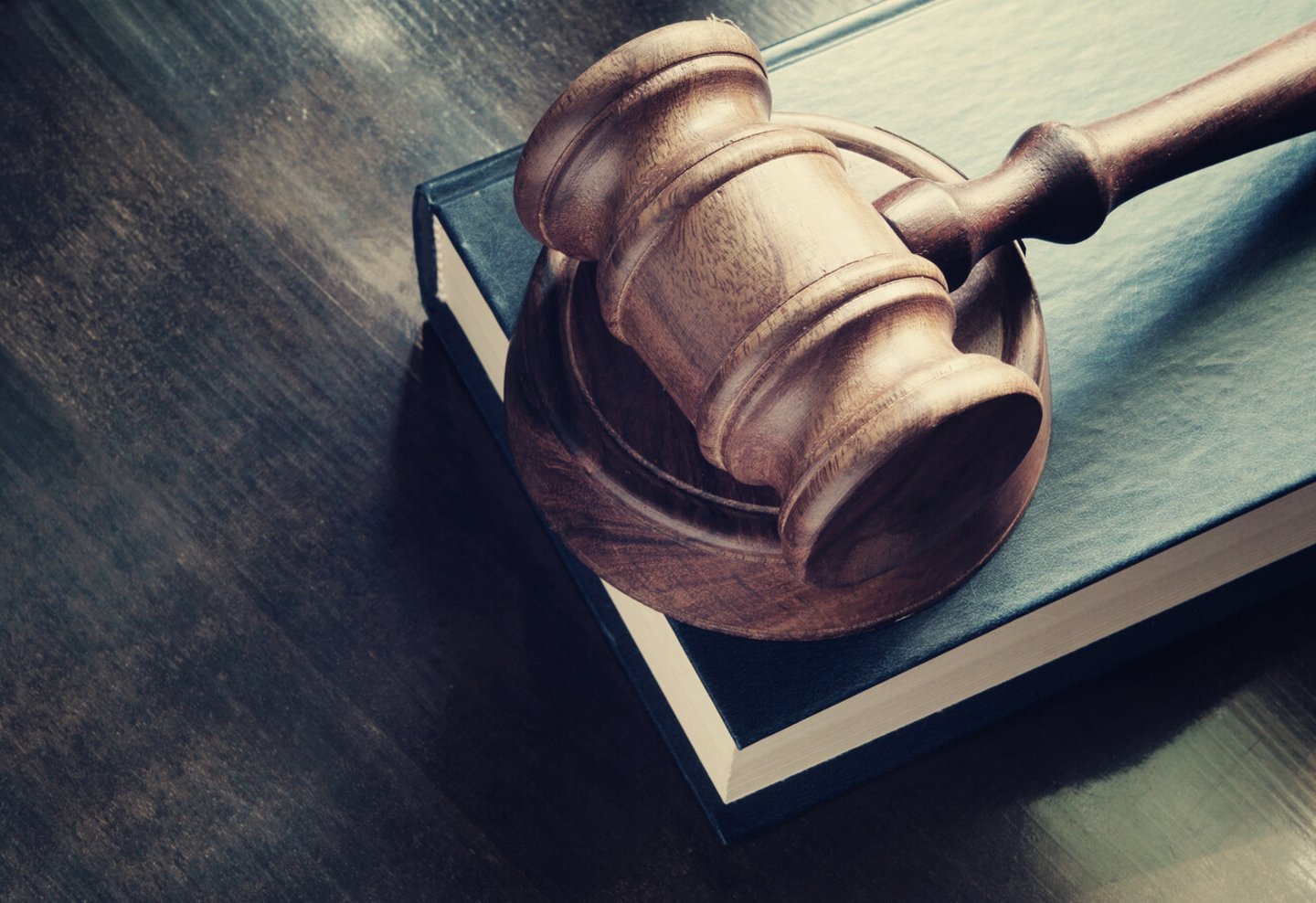 Judge gavel and legal book on wooden table, justice and law concept; Shutterstock ID 299616500