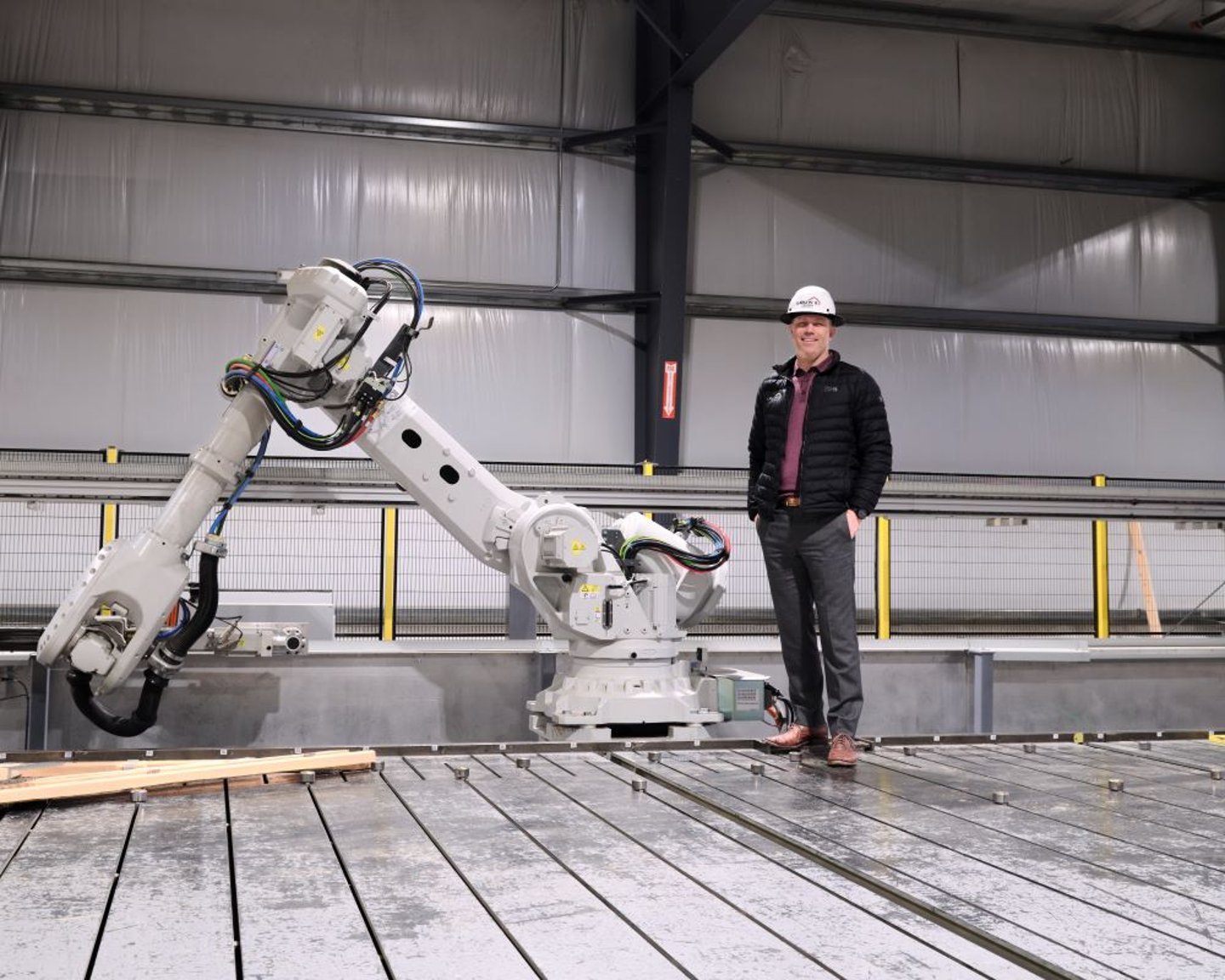 Roof truss assembly robotics at Louws Truss.