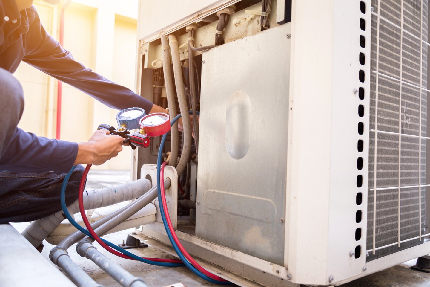 Technician is checking air conditioner ,measuring equipment for filling air conditioners.; Shutterstock ID 1492986716