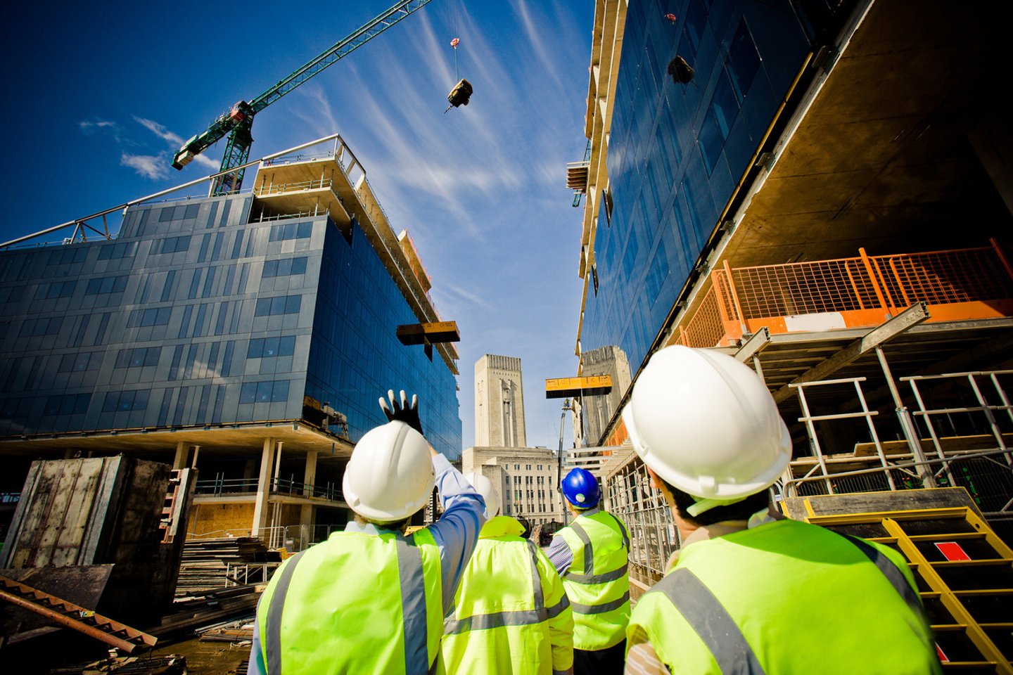 building under construction with workers; Shutterstock ID 57862405