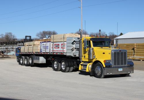 a truck is parked on the side of a road