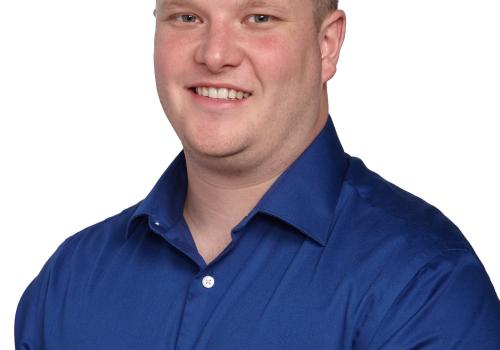 a man wearing a blue shirt