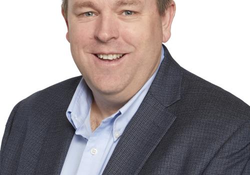 a man wearing a suit and tie