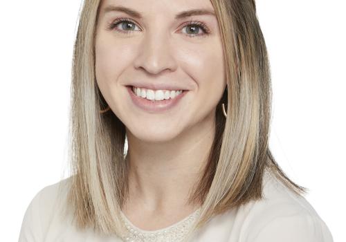 a woman smiling for the camera