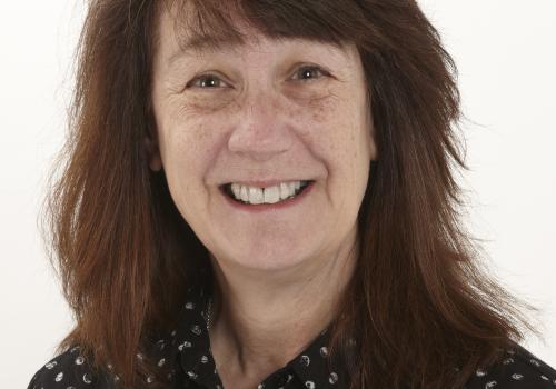 a woman smiling for the camera